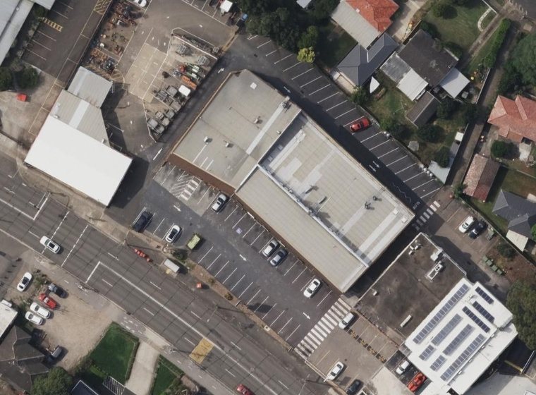 Aerial photo of the Kellyville shopping complex and its car parks